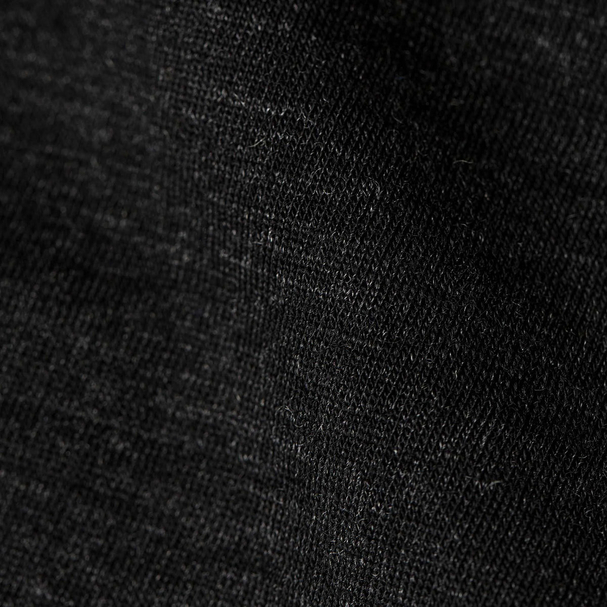 The Zaha Henley in Heather Black