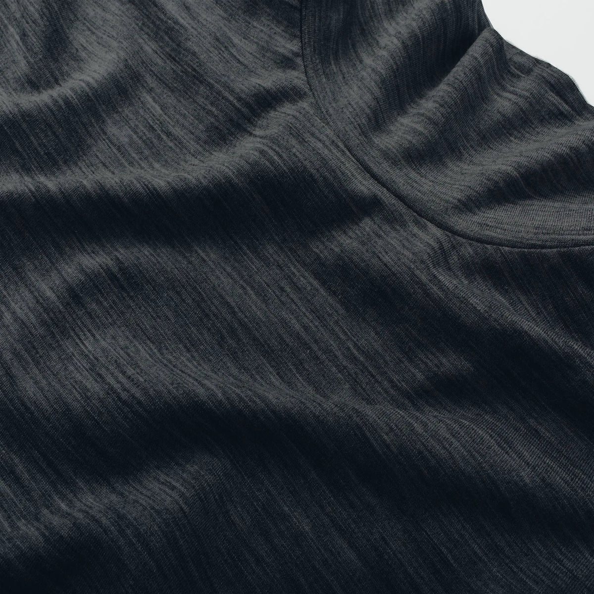 The Mercerized Merino Turtle Neck in Heather Black