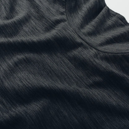 The Mercerized Merino Turtle Neck in Heather Black