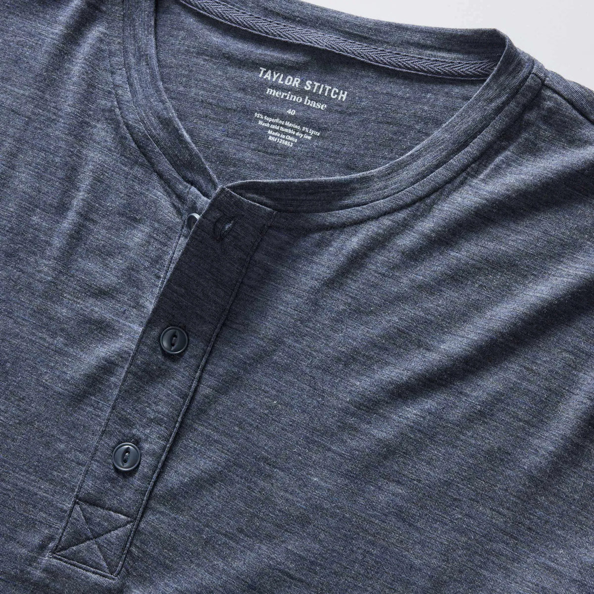 The Merino Henley in Heather Navy