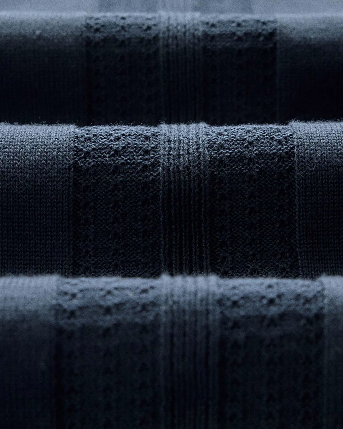The Button Down Polo in Dark Navy Stripe