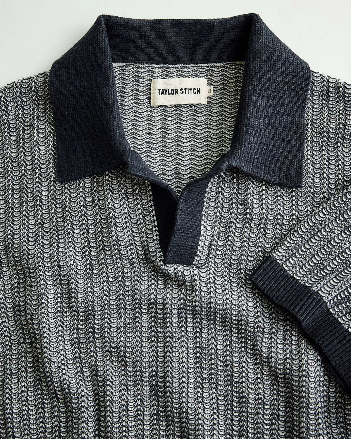 The Valencia Sweater Polo in Coal Scallop