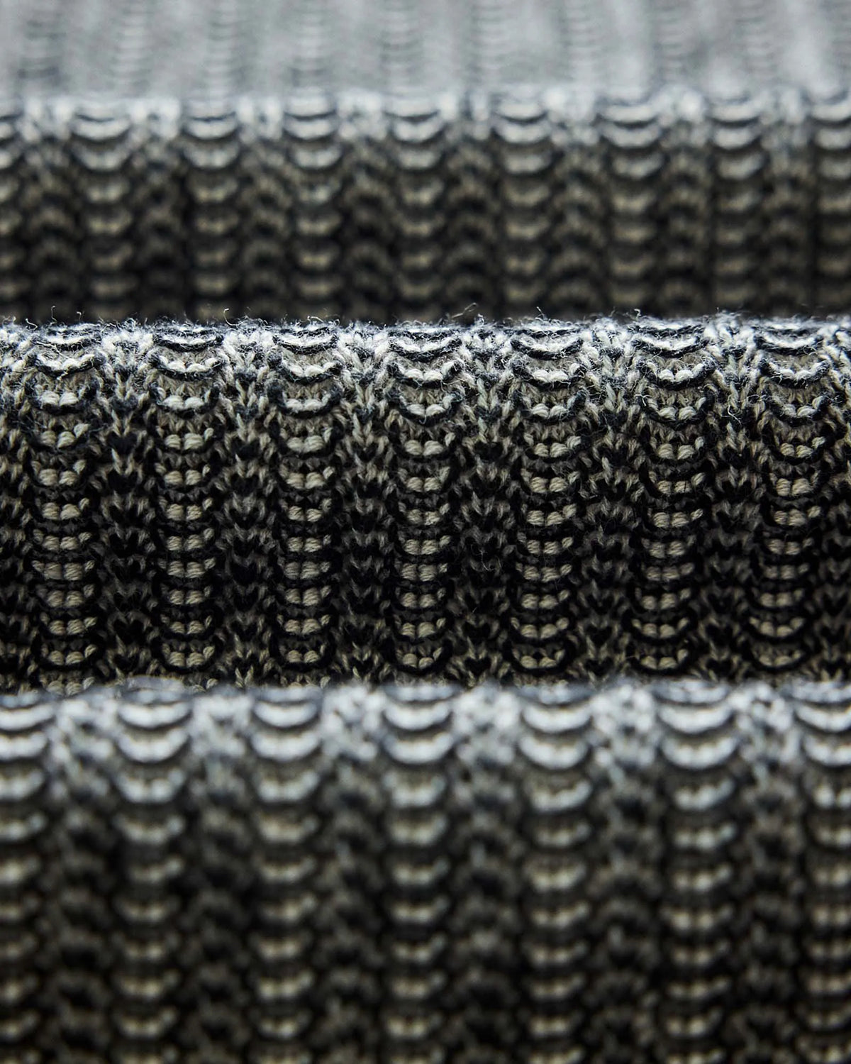 The Valencia Sweater Polo in Coal Scallop