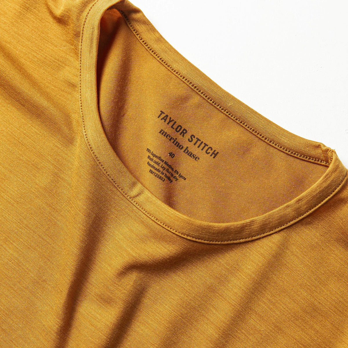The Merino Tee in Heather Saffron