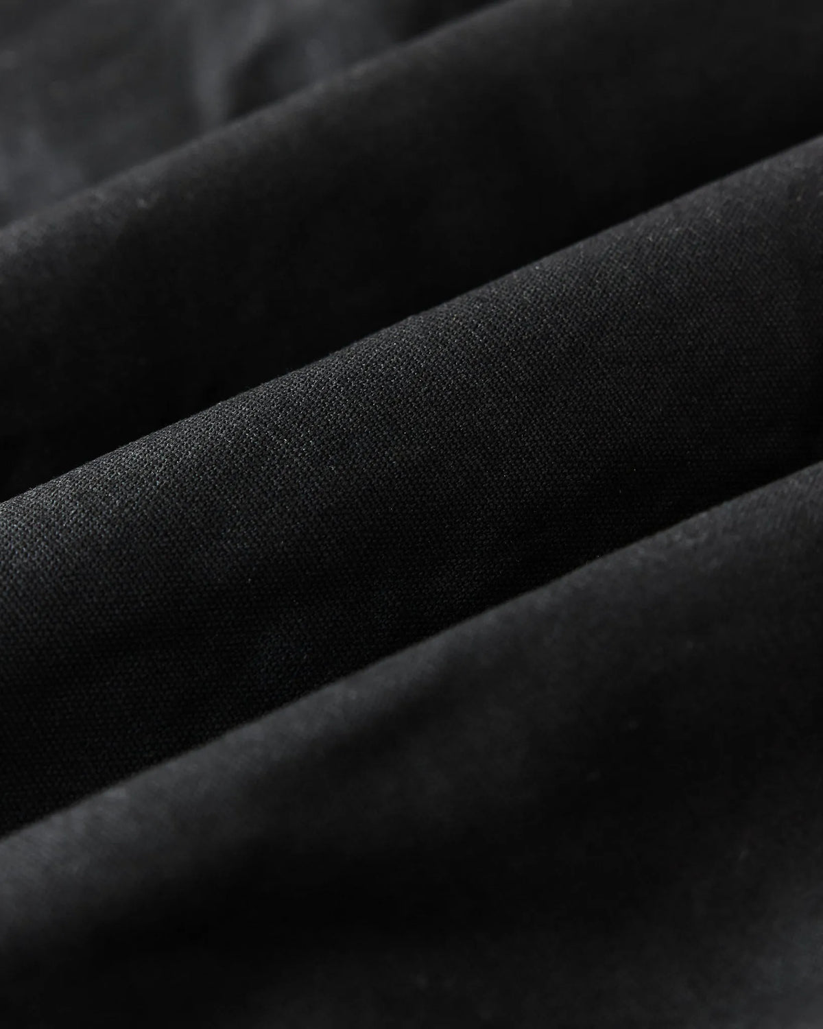 The Insulated Bomber Jacket in Coal Dry Wax