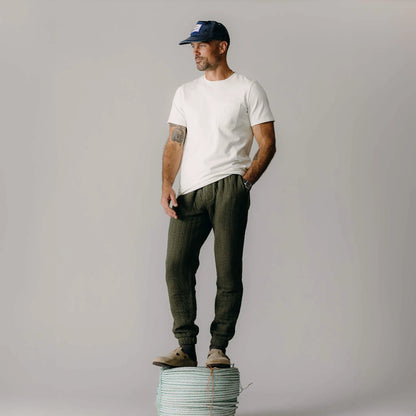 The Apres Pant in Heather Fatigue Olive Quilted Jersey