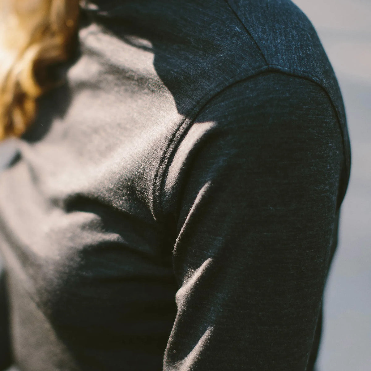 The Mercerized Merino Turtle Neck in Heather Black