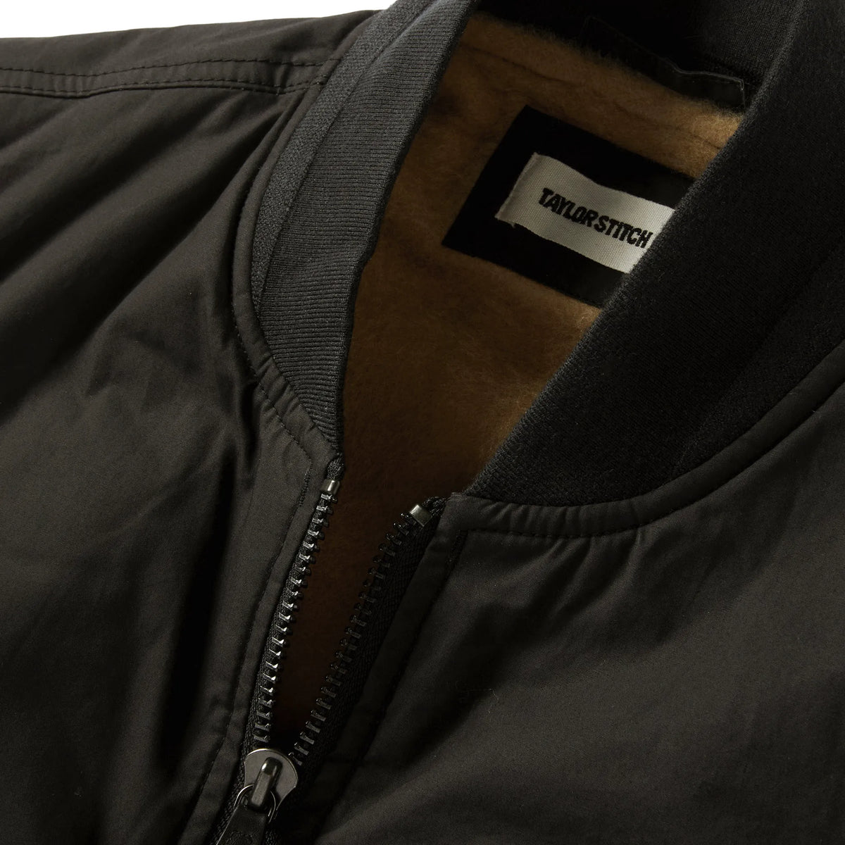 The Ignition Vest in Coal Dry Wax
